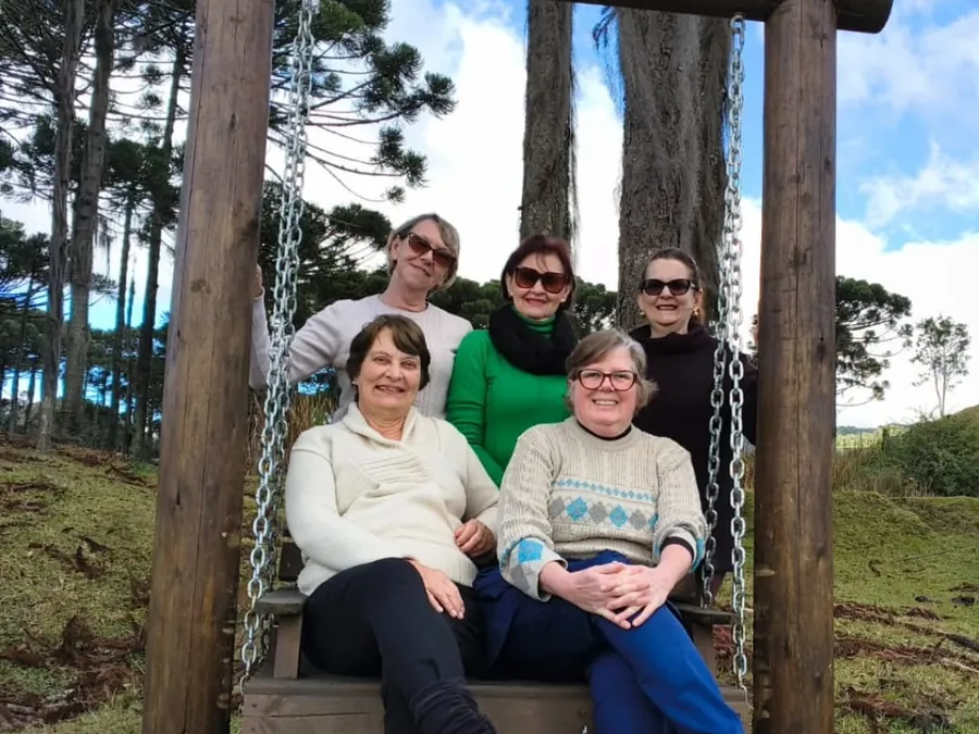 Grupo de viajantes no balanço em Rancho Queimado/SC
